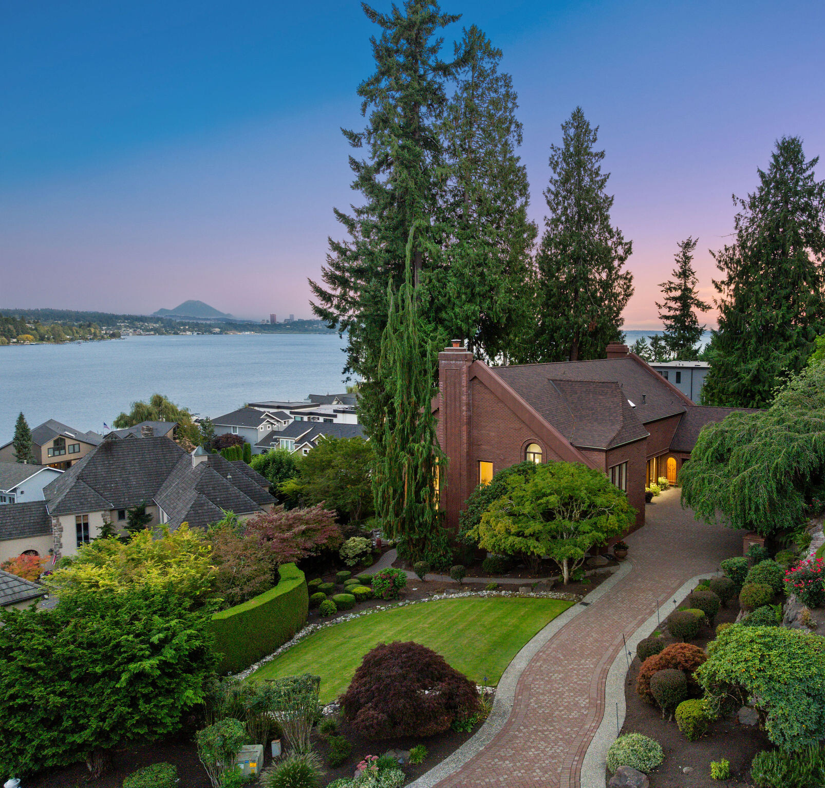 Aerial view of a luxury Kirkland home overlooking Lake Washington at sunset